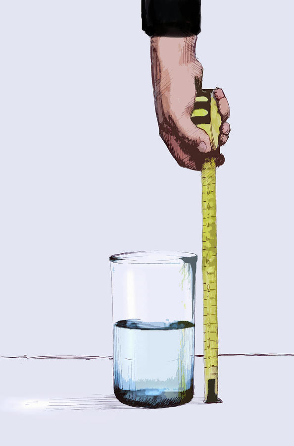 Man Measuring Water In Half Full Glass Photograph by Ikon Ikon Images
