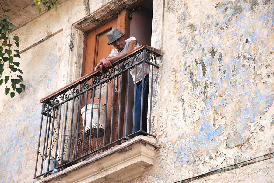 Man on Balcony Photograph by Andrea Simon