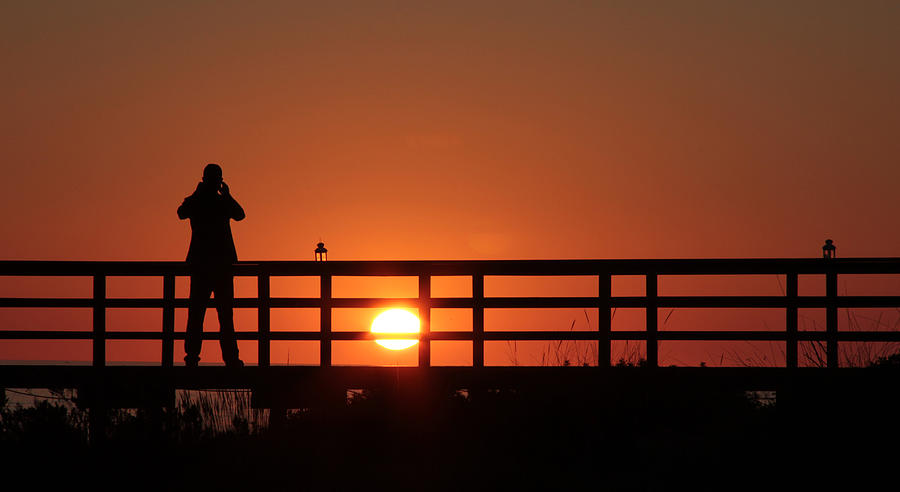 Man on Bridge at Sunset Photograph by Chris Clark