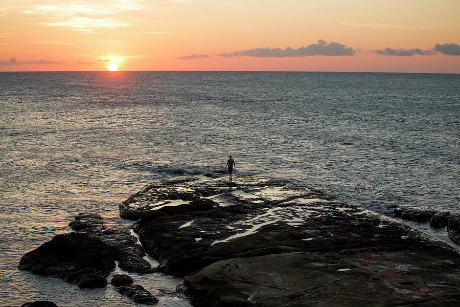 Man On Rock By Sea At Sunset Photograph by James Morgan