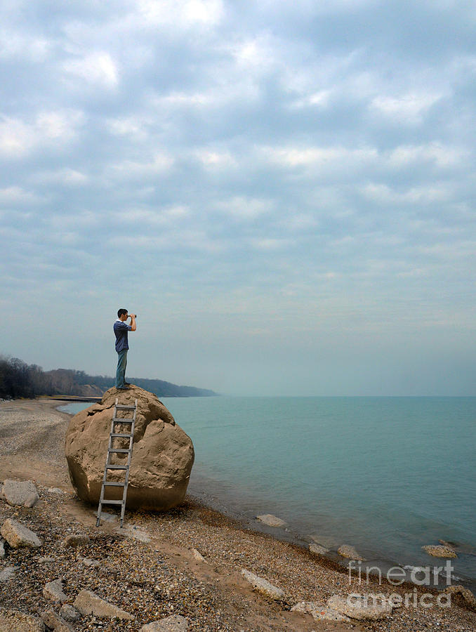 Man on Rock Looking Out To Sea Photograph by Jill Battaglia