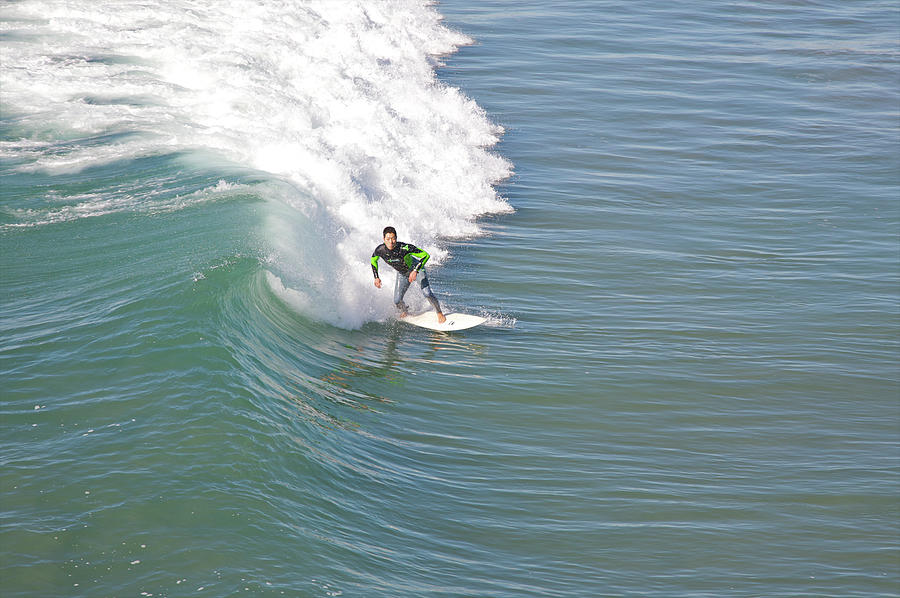 Man On Surfboard Seen From Above Photograph by Barry Winiker