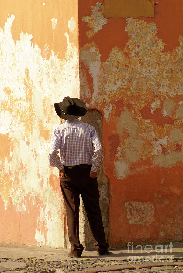 MAN ON THE CORNER Antigua Guatemala Photograph by John  Mitchell
