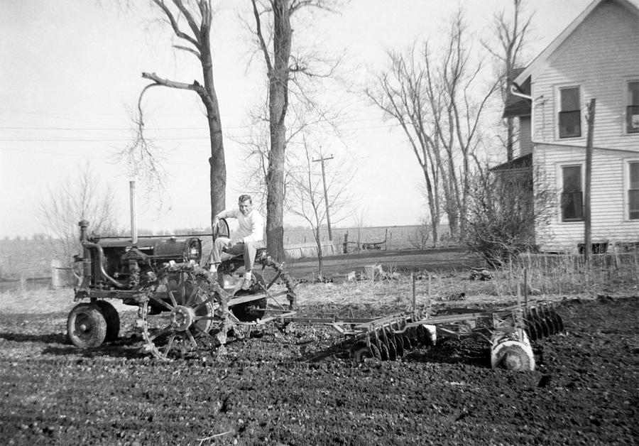 Man On Tractor Disking 1941, Retro Photograph by NNehring