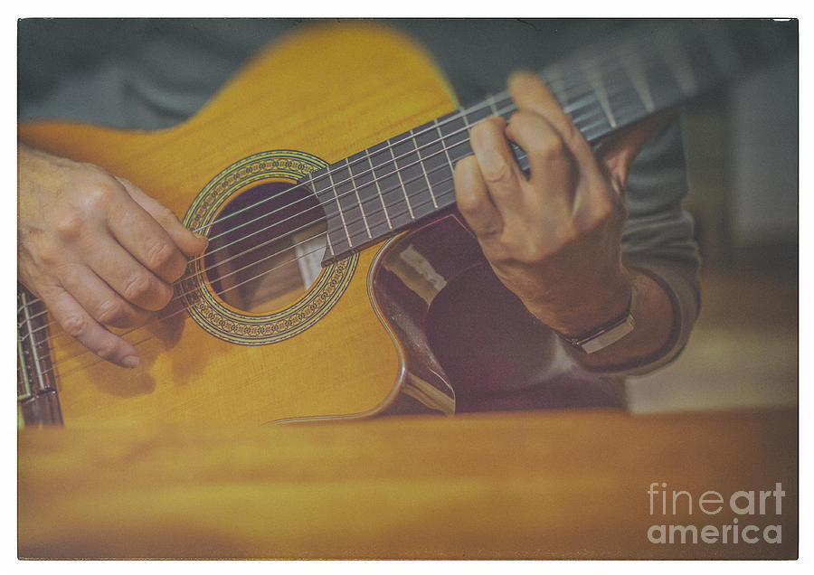 Man playing acoustic guitar Photograph by Patricia Hofmeester