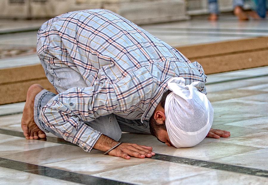 Man praying at Golden Temple Photograph by Louis Kleynhans - Fine Art ...