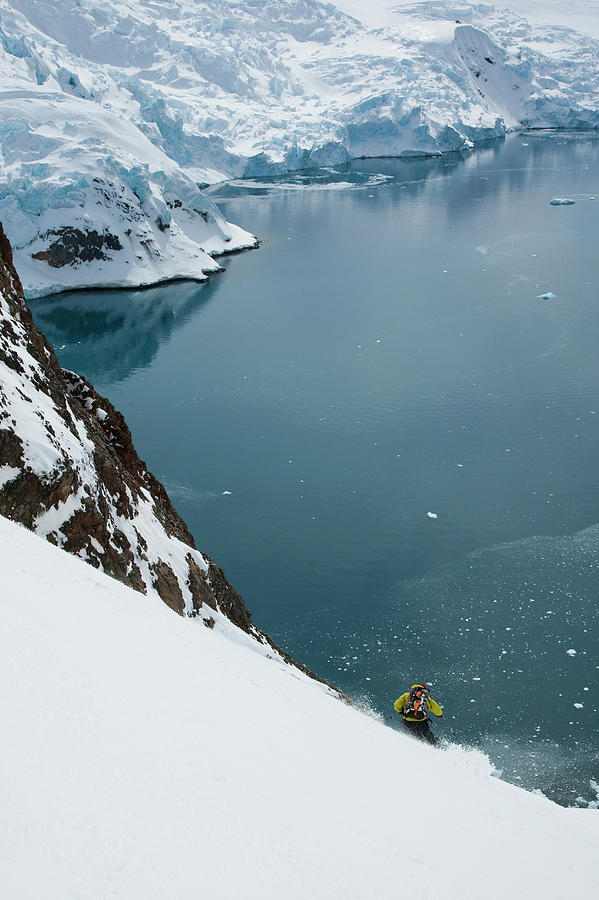 Winter Photograph - Man Skiing To The Ocean With Glacier by Adam Clark