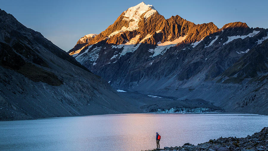 Man Standing In Front Of Mountain Lake Photograph by Lachlan Gardiner