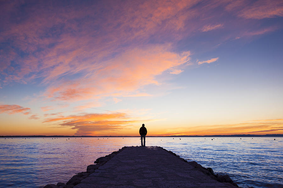 Man standing on jetty Photograph by AngiePhotos Man standing on jetty Photograph by AngiePhotos