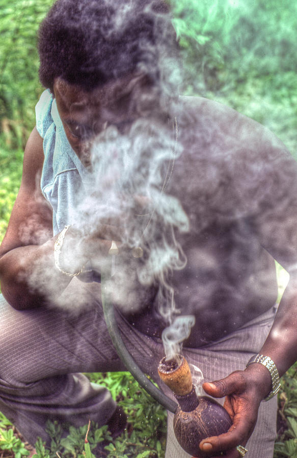 Pot Photograph - Man taking his Marijuana prescription. by Errol Wilson