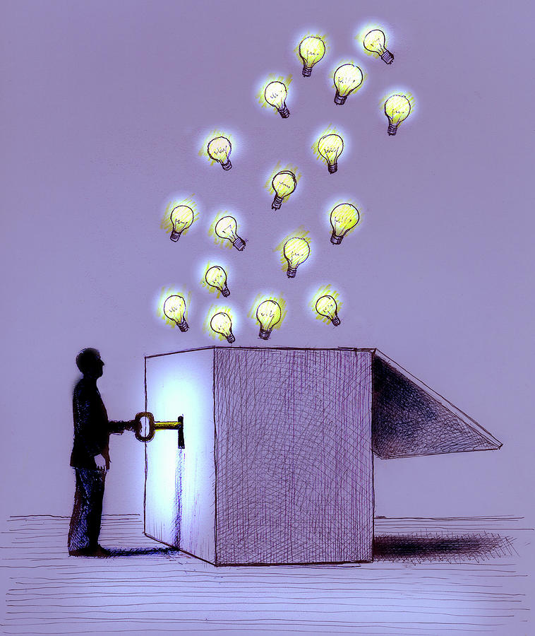Man Unlocking Illuminated Light Bulbs Photograph by Ikon Ikon Images