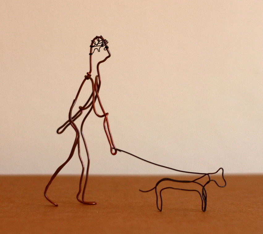 Dog Sculpture - Man Walking Dog by Mel Drucker