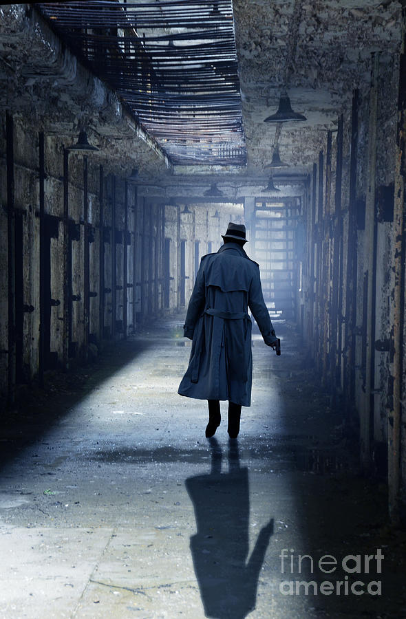 Man Walking in Abandoned Prison with Gun Photograph by Jill Battaglia