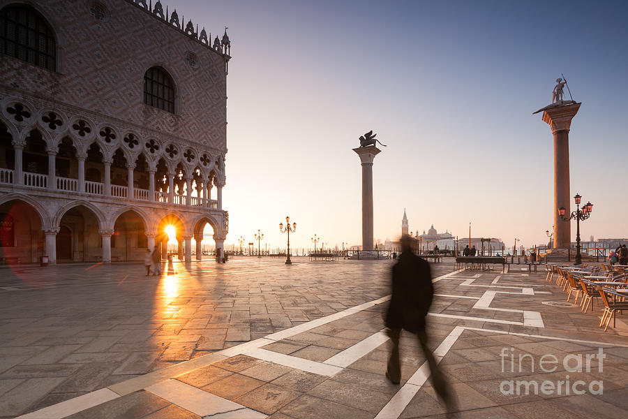 Man walking near Doges palace in Venice Photograph by Matteo Colombo