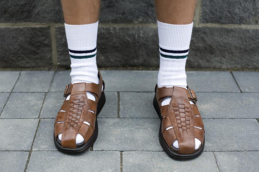 Man wearing sandals Photograph by Image Source