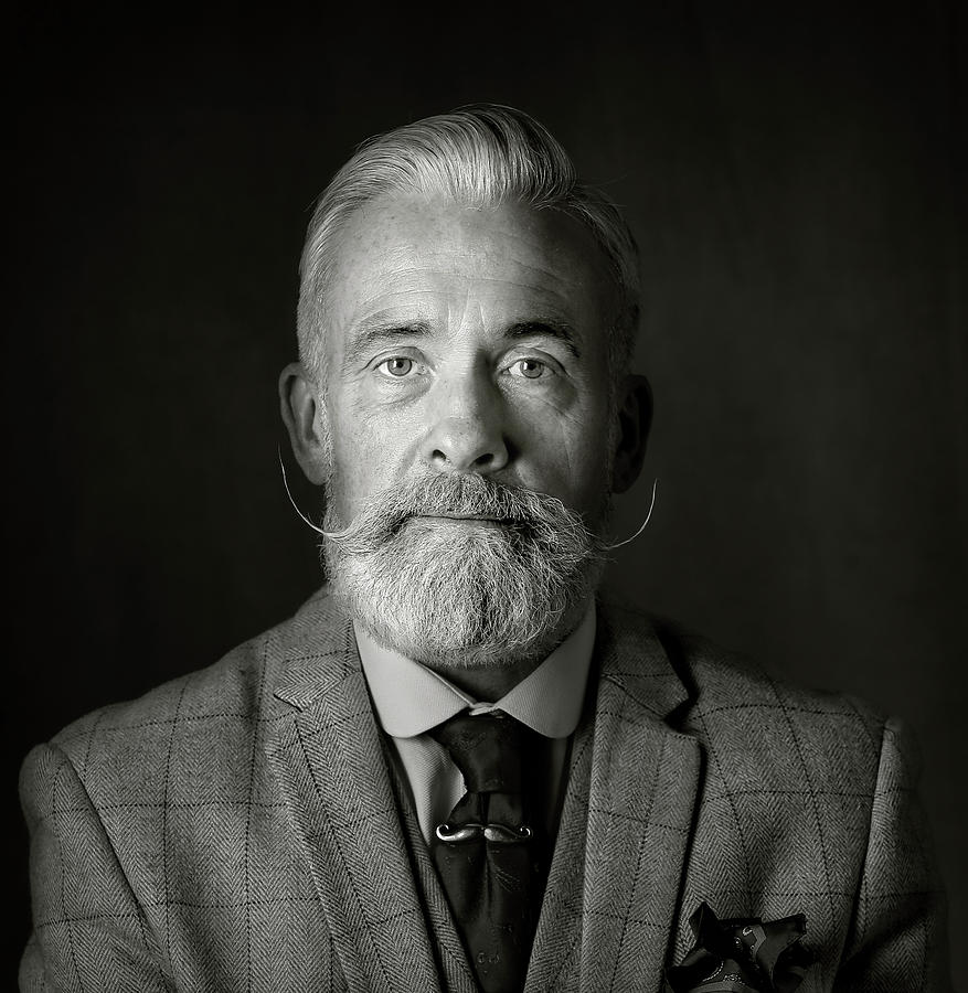 Black And White Photograph - Man With A Tash by Hugh Wilkinson