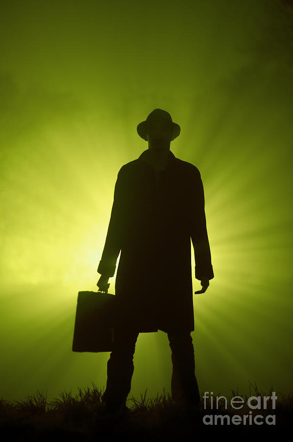 Man With Case In Green Light Photograph by Lee Avison