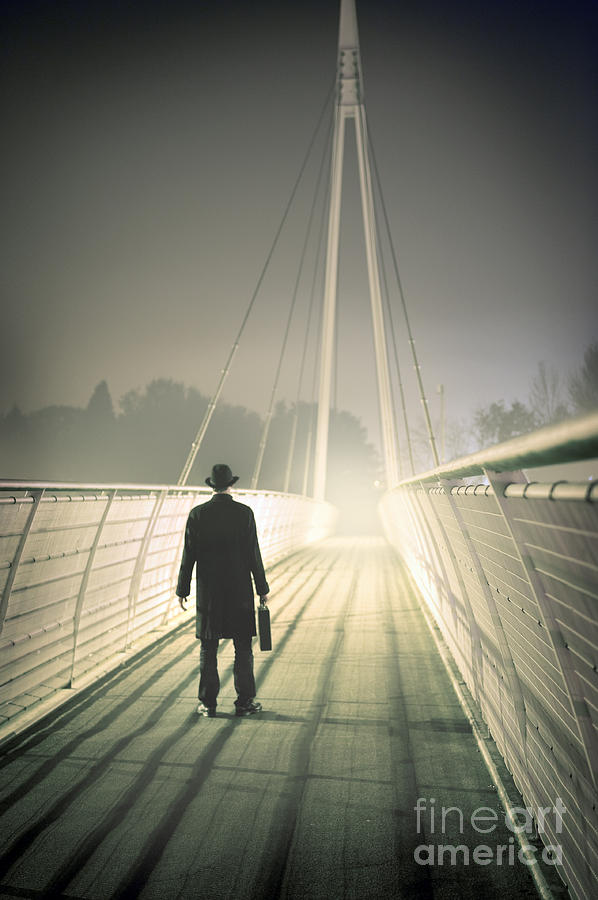 Man With Case On Bridge Photograph by Lee Avison