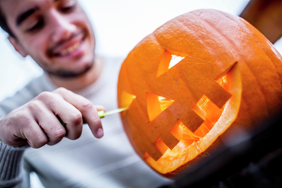 Man With Halloween Pumpkin Photograph by Science Photo Library - Pixels