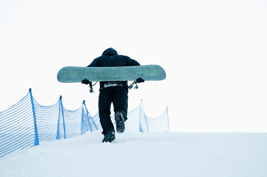 Man With Snowboard Moving Up Photograph by Helena Wahlman Man With Snowboard Moving Up Photograph by Helena Wahlman