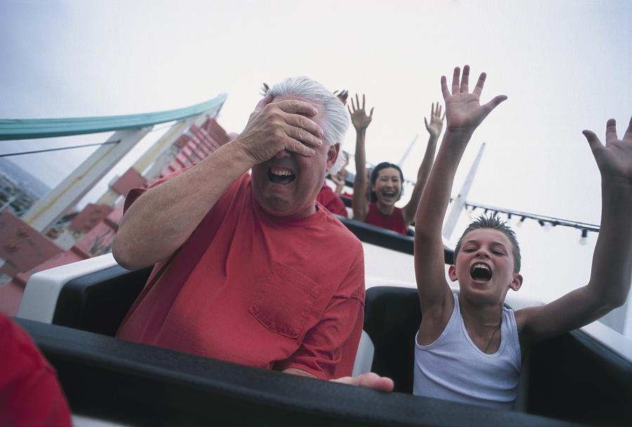 Man with Son on Rollercoaster Photograph by Zia Soleil