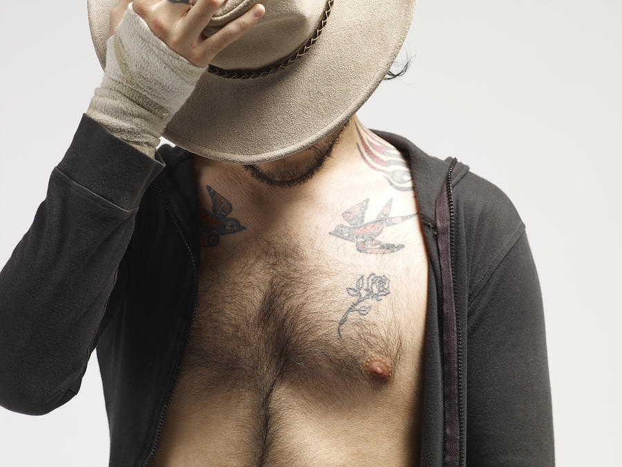 Man with sweater unzipped and a hat Photograph by Experienced Skins