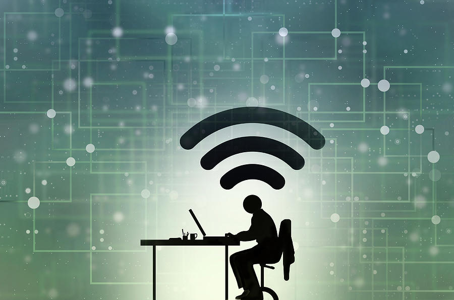 Man Working At Desk Connected Photograph by Ikon Images