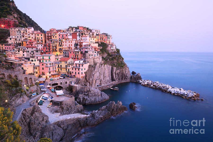 Manarola at dusk in the Cinque Terre Italy Photograph by Matteo Colombo