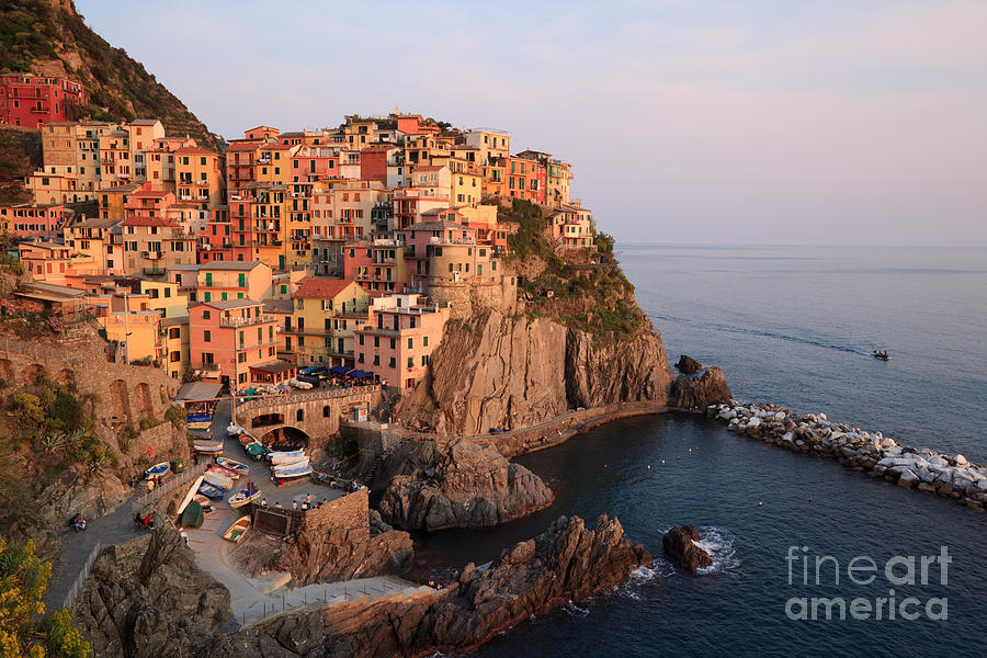 Manarola at sunset in the Cinque Terre Italy Photograph by Matteo Colombo