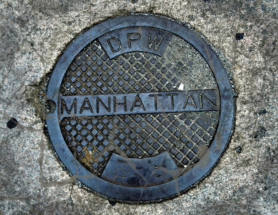 Manhattan Man Hole Cover Photograph by Joan Reese