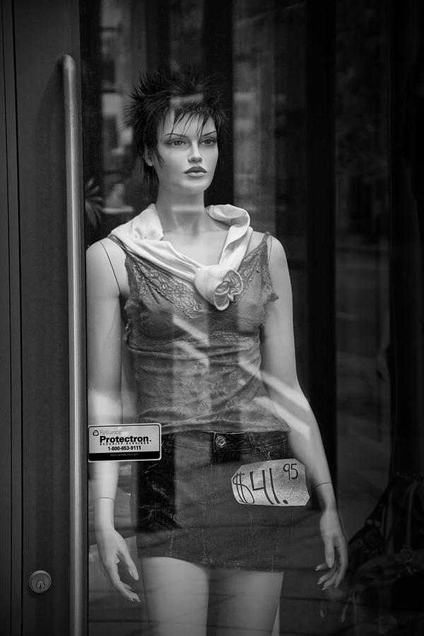 Mannequin sale display in a storefront window Photograph by Randall Nyhof