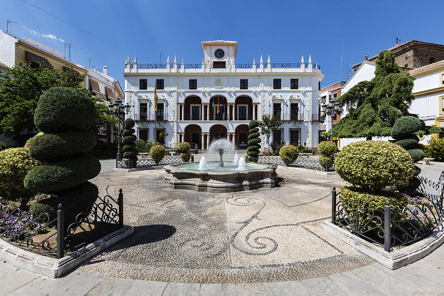 Mansion and courtyard with fountain and shrubs, Priego de Cordoba, Andalusia, Spain Photograph by Pixelchrome Inc