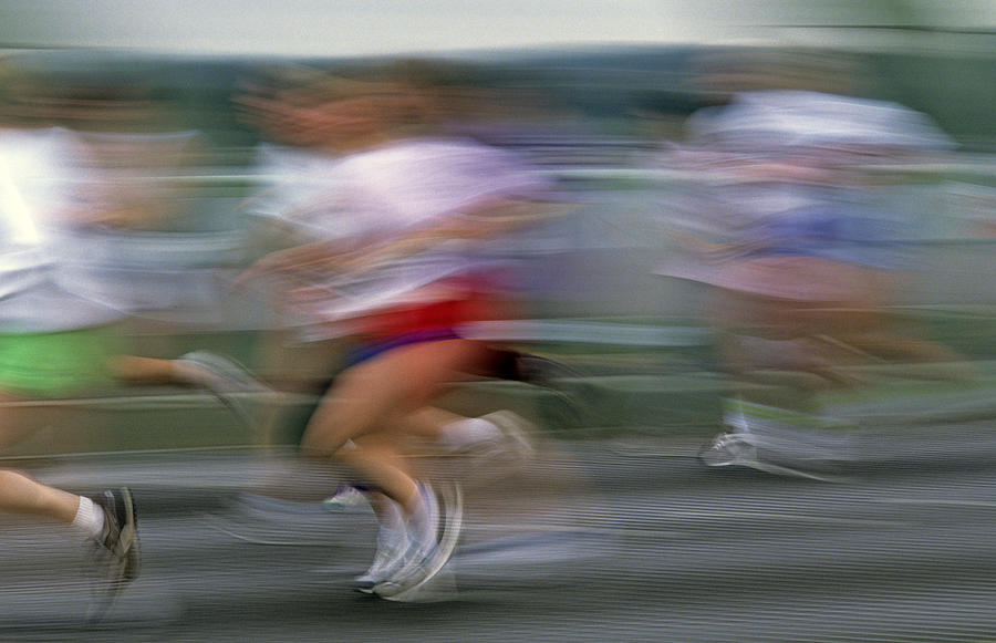 Marathon race downtown Seattle motion blurred runners Photograph by Jim Corwin