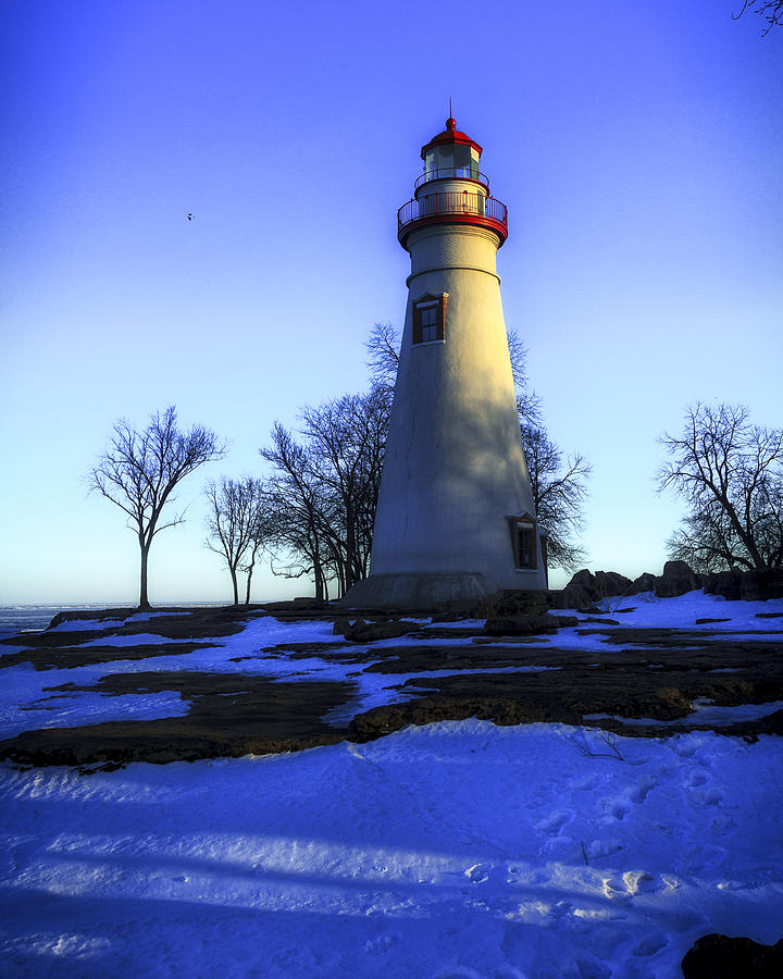 Marblehead Lighthouse Ohio Winter sunset Photograph by Jack R Perry