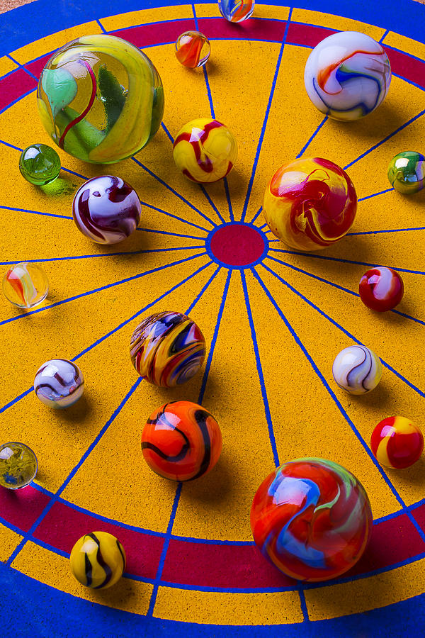 Marbles On Game Board Photograph by Garry Gay