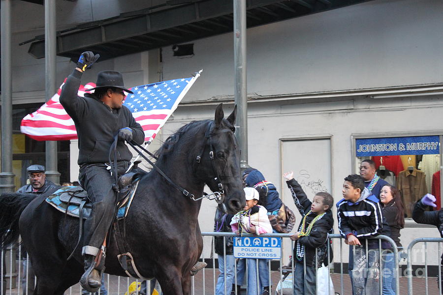 Mardi Gras Cowboy with Flag Photograph by Bev Conover