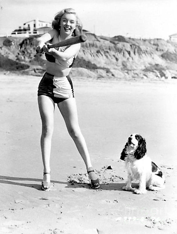 Marilyn playing baseball at the beach Photograph by Vintage Collectables