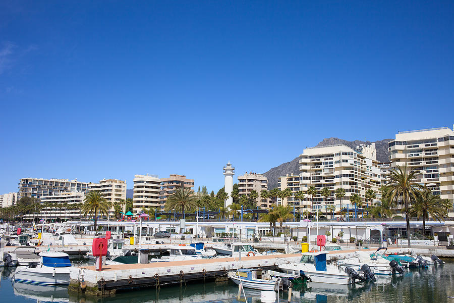 Marina and Apartment Buildings in Marbella Photograph by Artur Bogacki