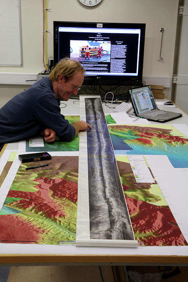 Marine Geologist Studying Seafloor Map Photograph by B. Murton/southampton Oceanography Centre