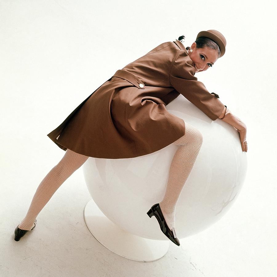 Marisa Berenson Posing On A Ball Photograph by Bert Stern