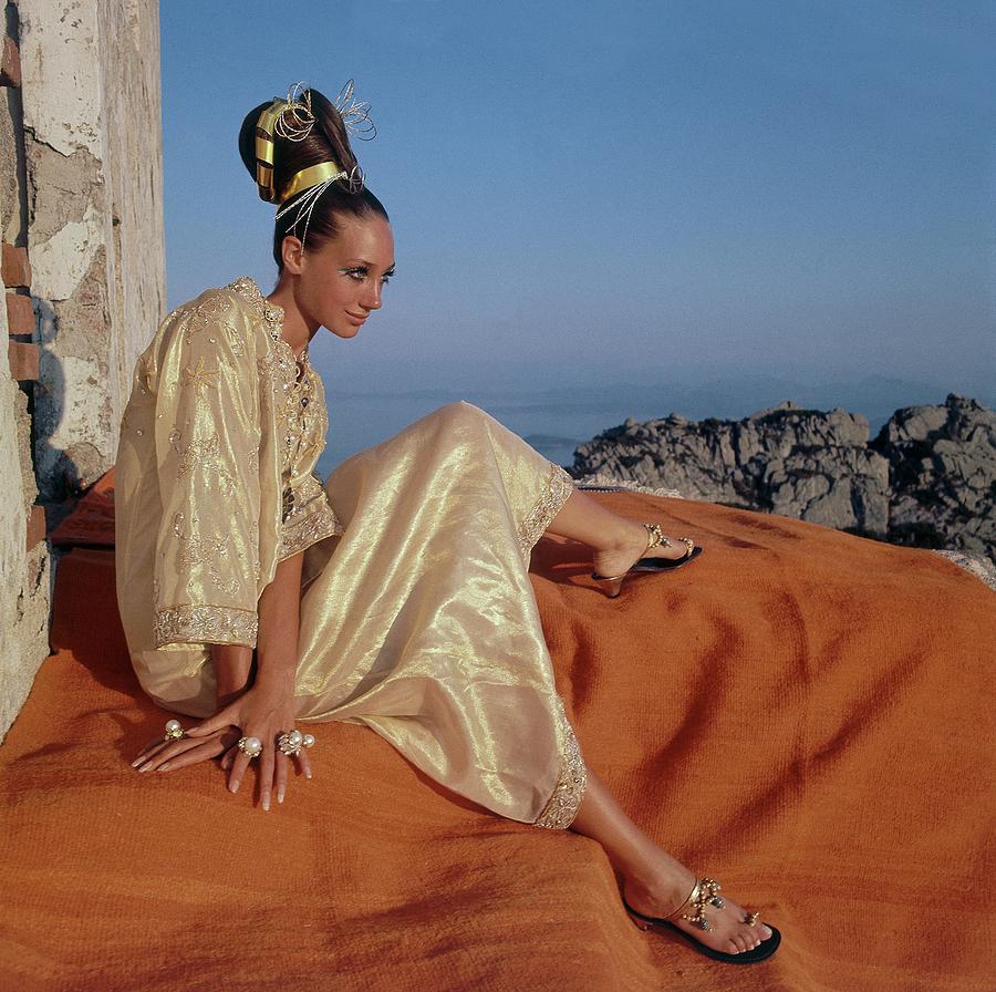 Marisa Berenson Wearing A Gold Caftan By Tina Photograph by Henry Clarke
