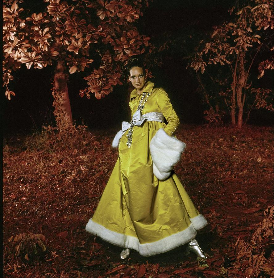 Marisa Berenson Wearing A Yellow Dress Photograph by Arnaud de Rosnay