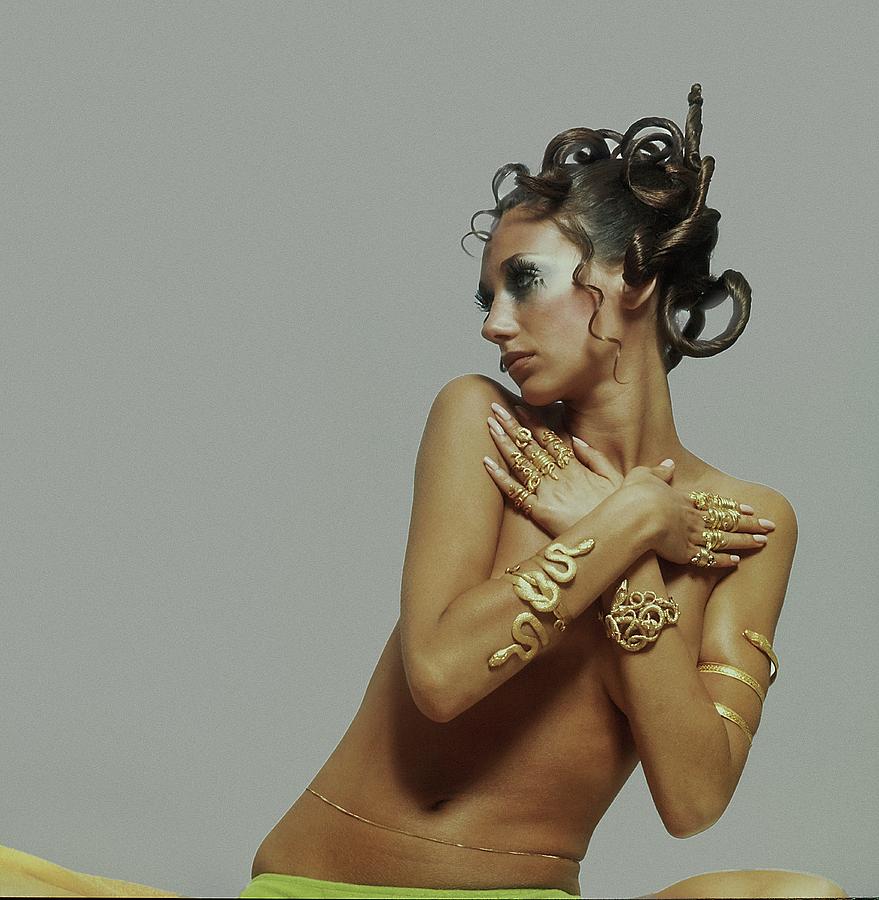 Marisa Berenson Wearing Gold Jewelry Photograph by Arnaud de Rosnay.