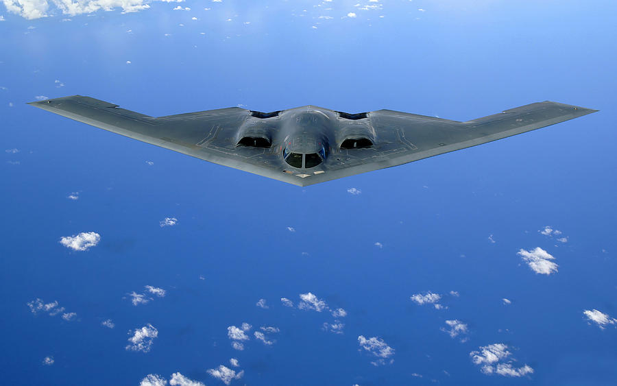 May 30, 2006 - A B-2 Spirit soars through the sky after a refueling mission over the Pacific Ocean. Photograph by Stocktrek Images