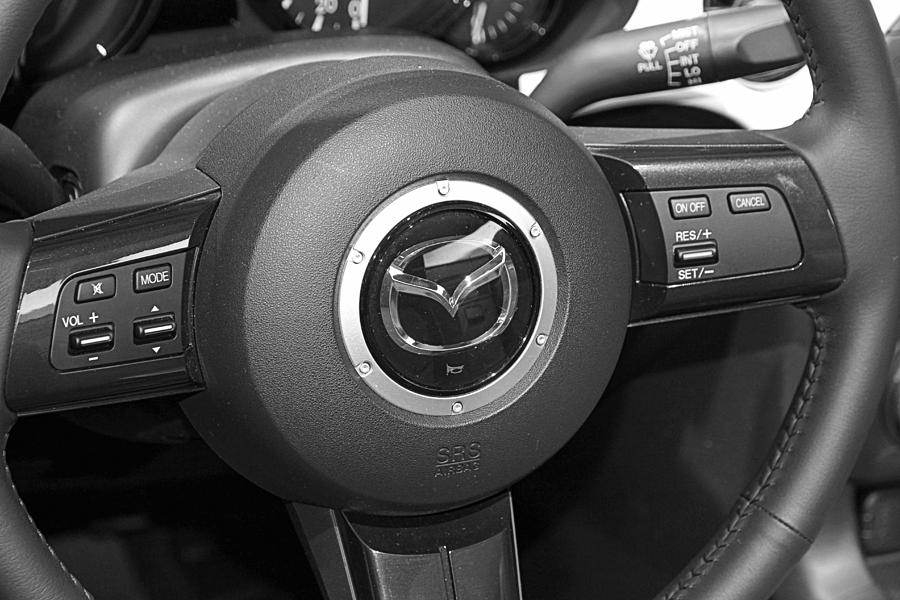 Car Photograph - Mazda Wheel by Valentino Visentini