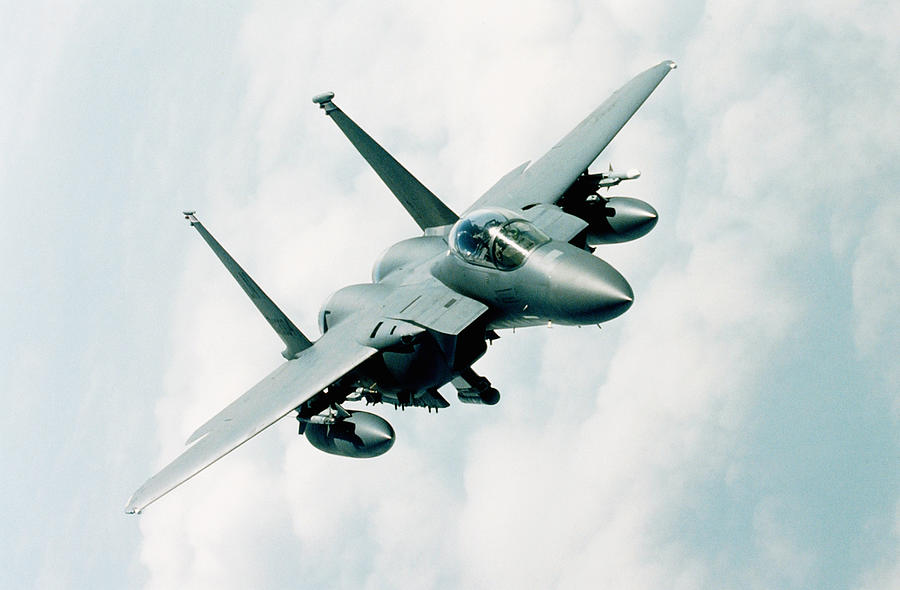 McDonnell Douglas F-15 Eagle in flight during training mission Photograph by Stocktrek
