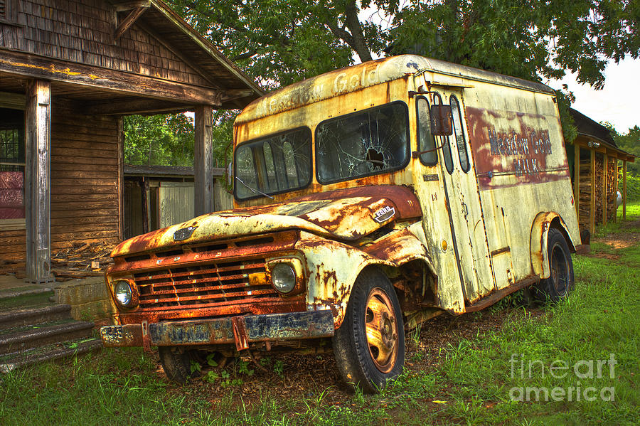 Rusty and Tired Meadow Gold Milk Ford Photograph by Reid Callaway