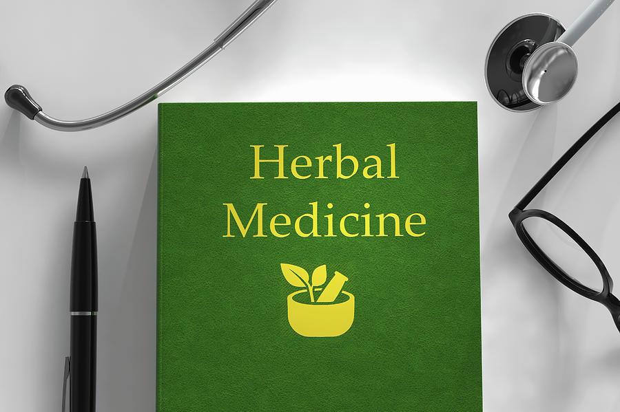 Medical Book About Herbal Medicine Photograph by Ikon Images