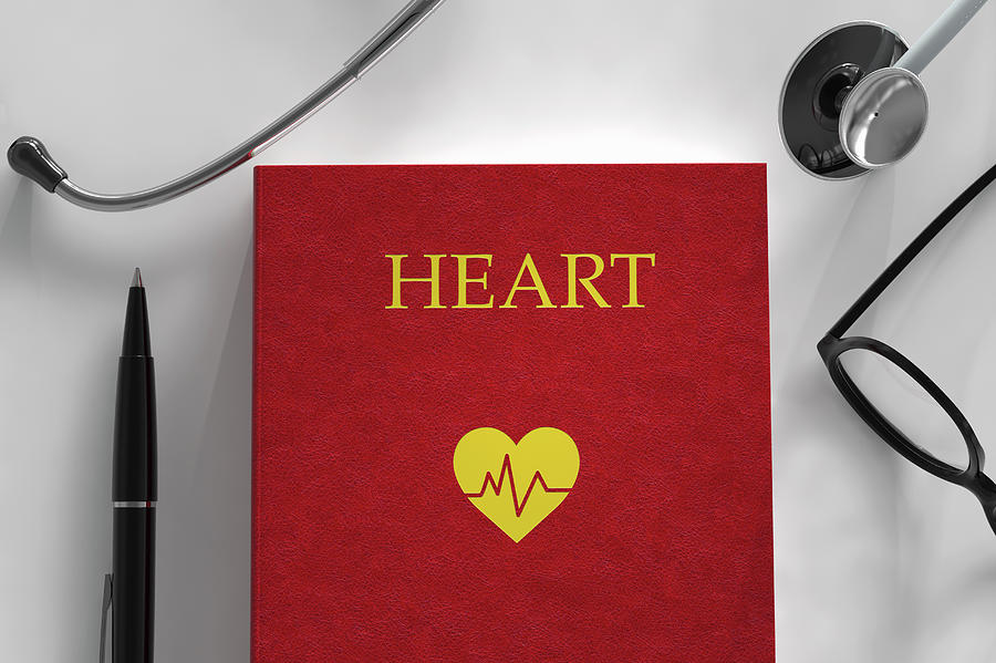 Medical Book About The Heart Photograph by Ikon Images