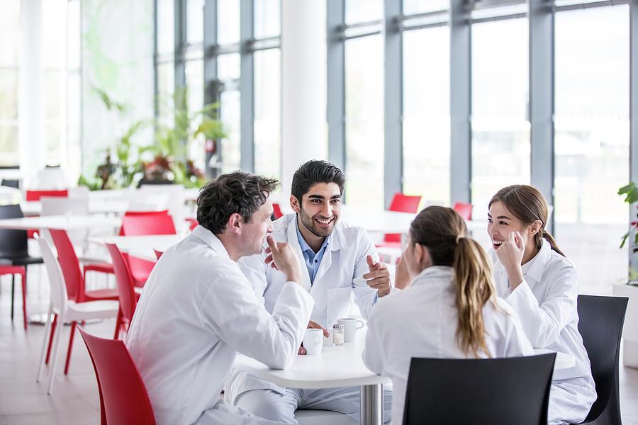 Medical Colleagues In Canteen Relaxing Photograph by Science Photo Library Medical Colleagues In Canteen Relaxing Photograph by Science Photo Library